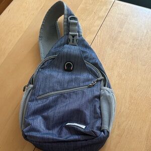 Zomake Blue Sling Bag with Grey Accents.